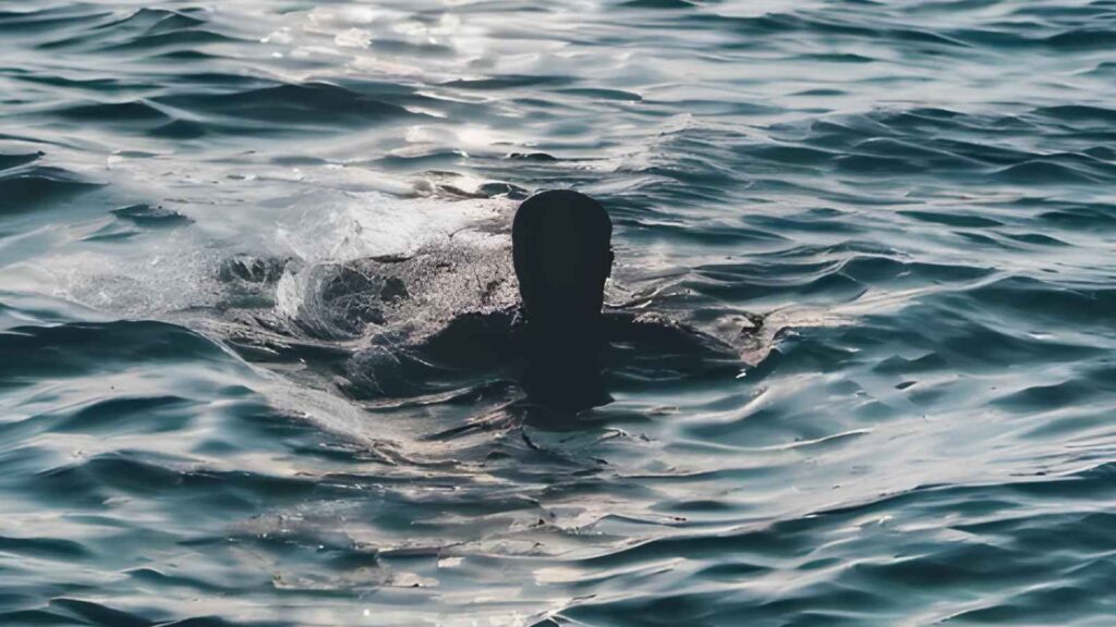 Man under water with sea attack