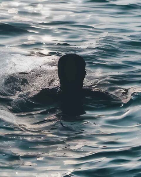 Man under water with sea attack